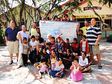 The Camel Classic organisation team present a cheque for B360,000 to the St. Camillus Foundation.